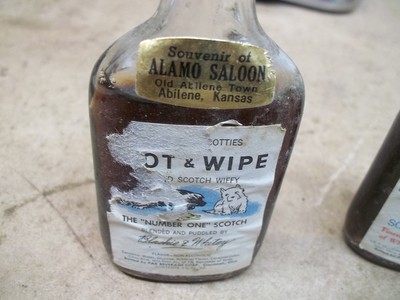 2 Old Souvenir Non-Alcohol Bottles from Abilene Town Saloon Kansas