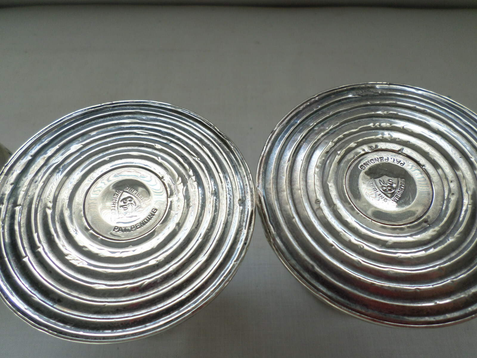 STERLING SILVER PAIR OF CANDLESTICKS WITH STERLING HURRICANE SHADE HOLDERS