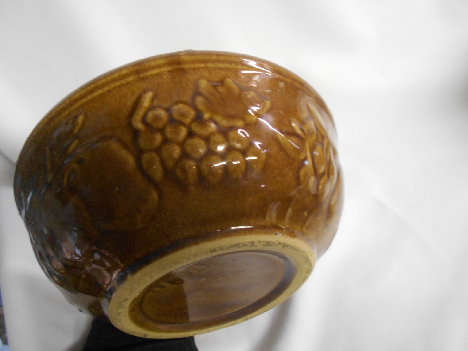 vintage USA brown crock / stoneware  bowl with embossed fruit design
