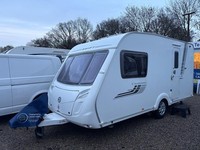 SWIFT CHARISMA 230 - 2 BERTH CARAVAN WITH END WASHROOM + MOTORMOVER
