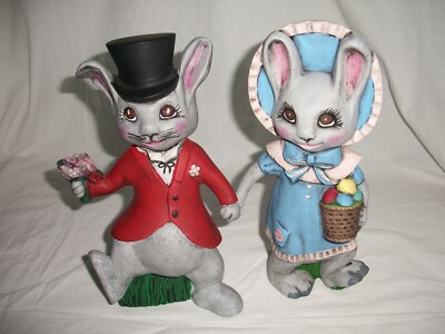 Male rabbit with flowers and female with Easter egg basket ceramic 10'' figurines