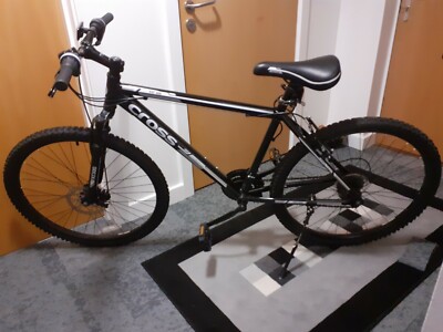 Bicycle Cross FXT300 26In wheel size . Unwanted gift -with stand and lock