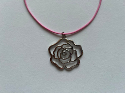 silver tone rose outline pendant on pink 19'' adj cord new elegant!