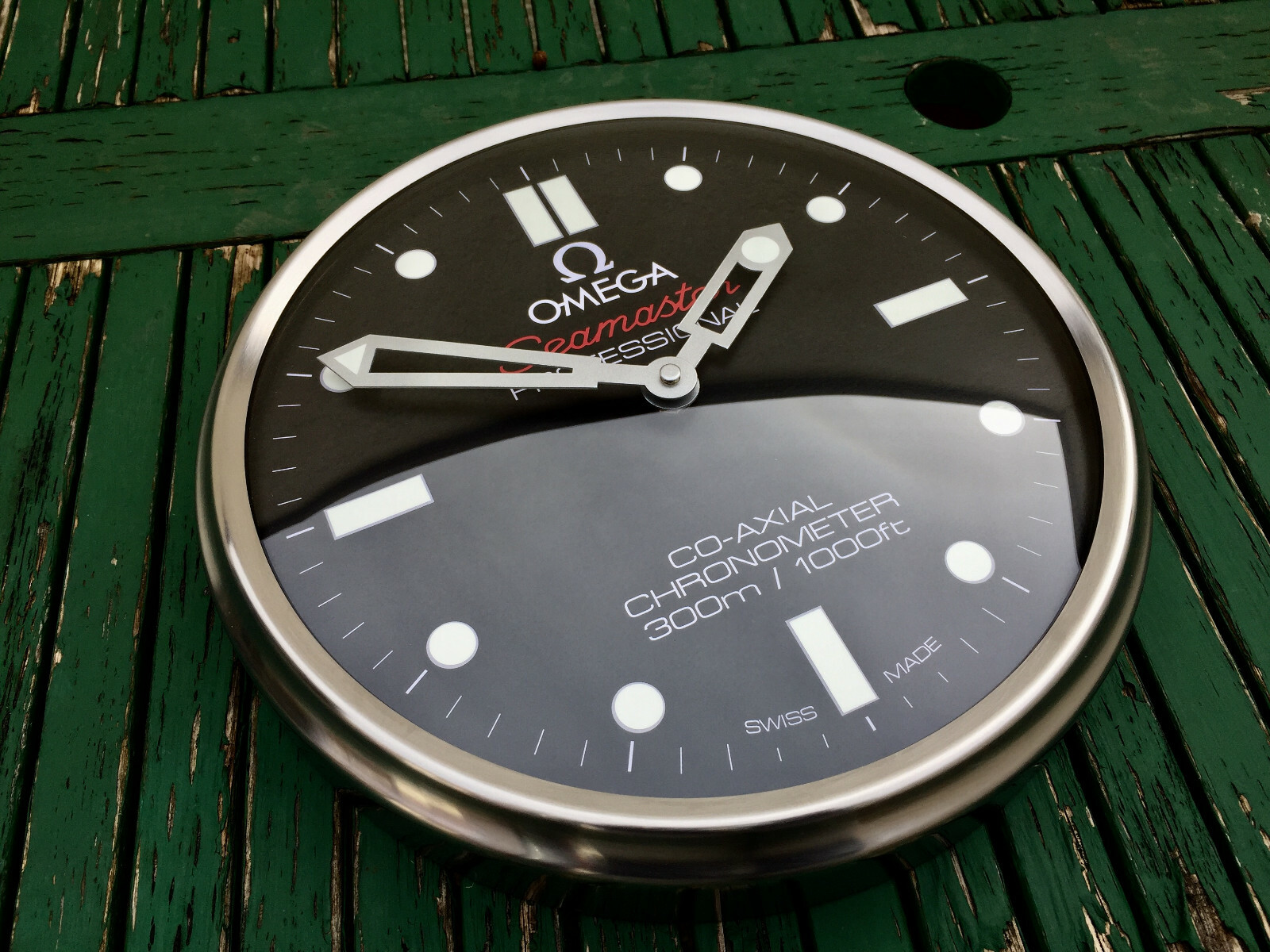 Часы dms 9 pro. Настенные часы omega. omega clock malachite. часы омега на солнечных батареях. часы omega 60-70 годов.
