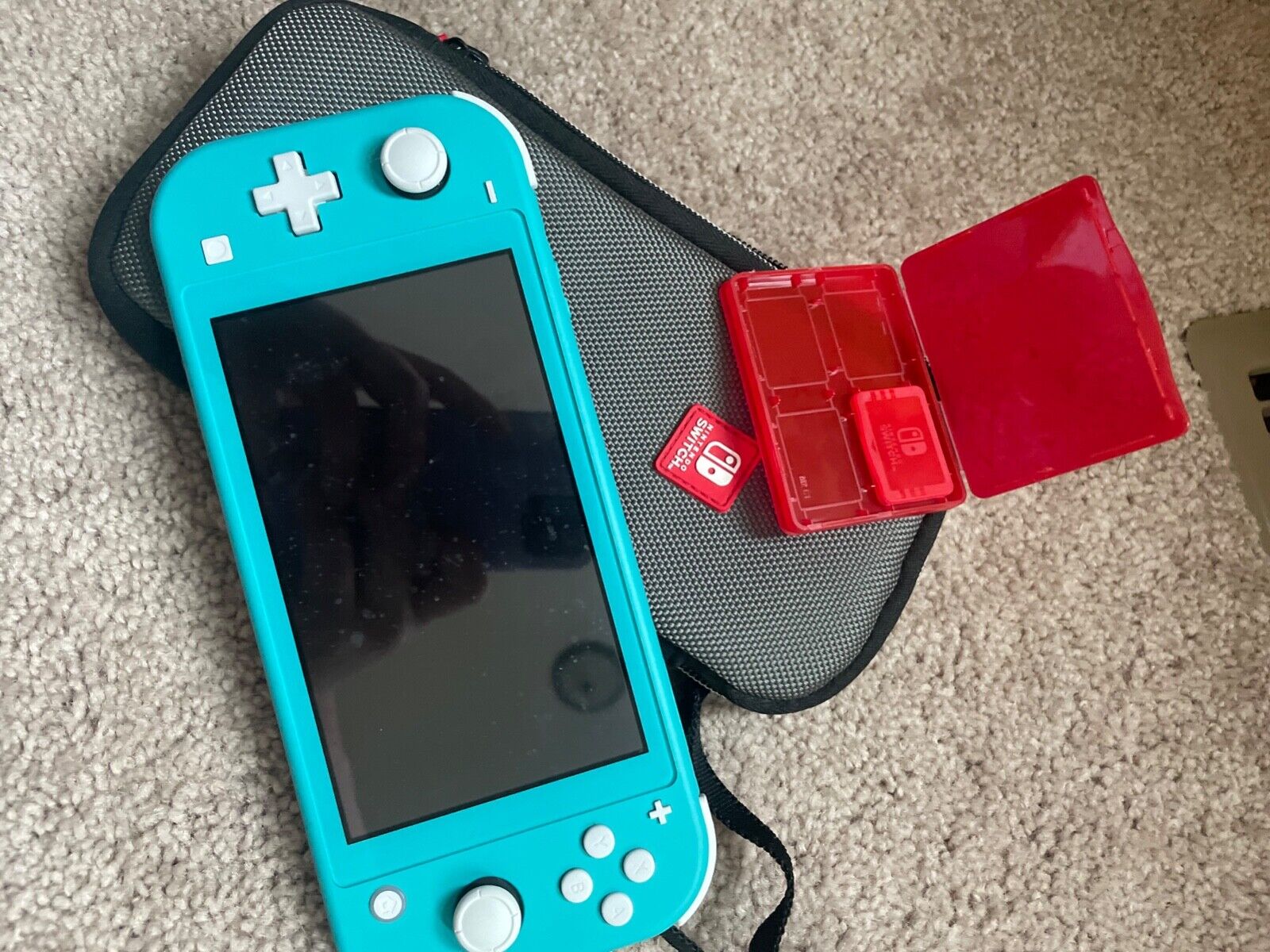 Nintendo Switch Lite - Turquoise with carrying case Nintendo Switch Lite - Turquoise with carrying case