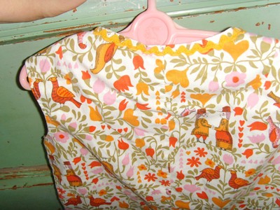 Darling vintage handmade baby girl outfit and pink plastic bunny hanger nursery