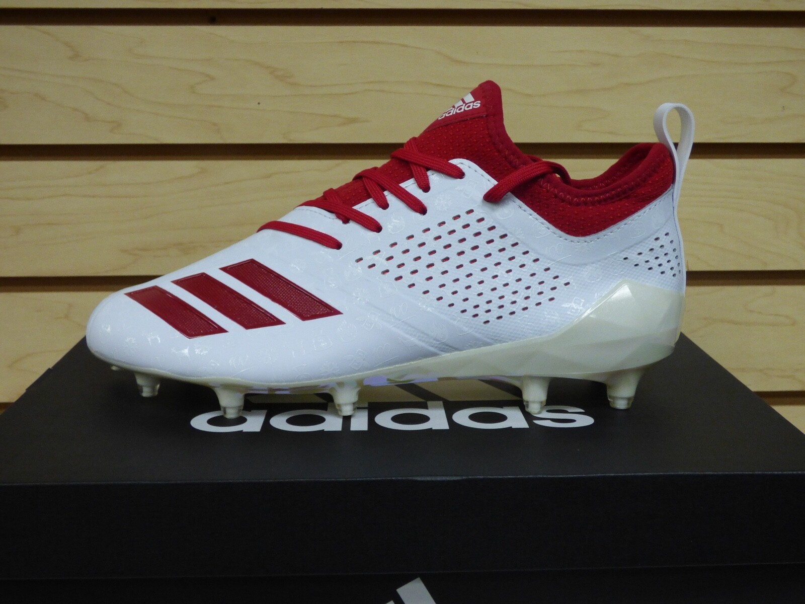 red and white adidas cleats