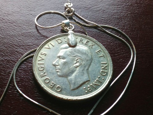 1939 Canada Parliament Silver Dollar on an 18