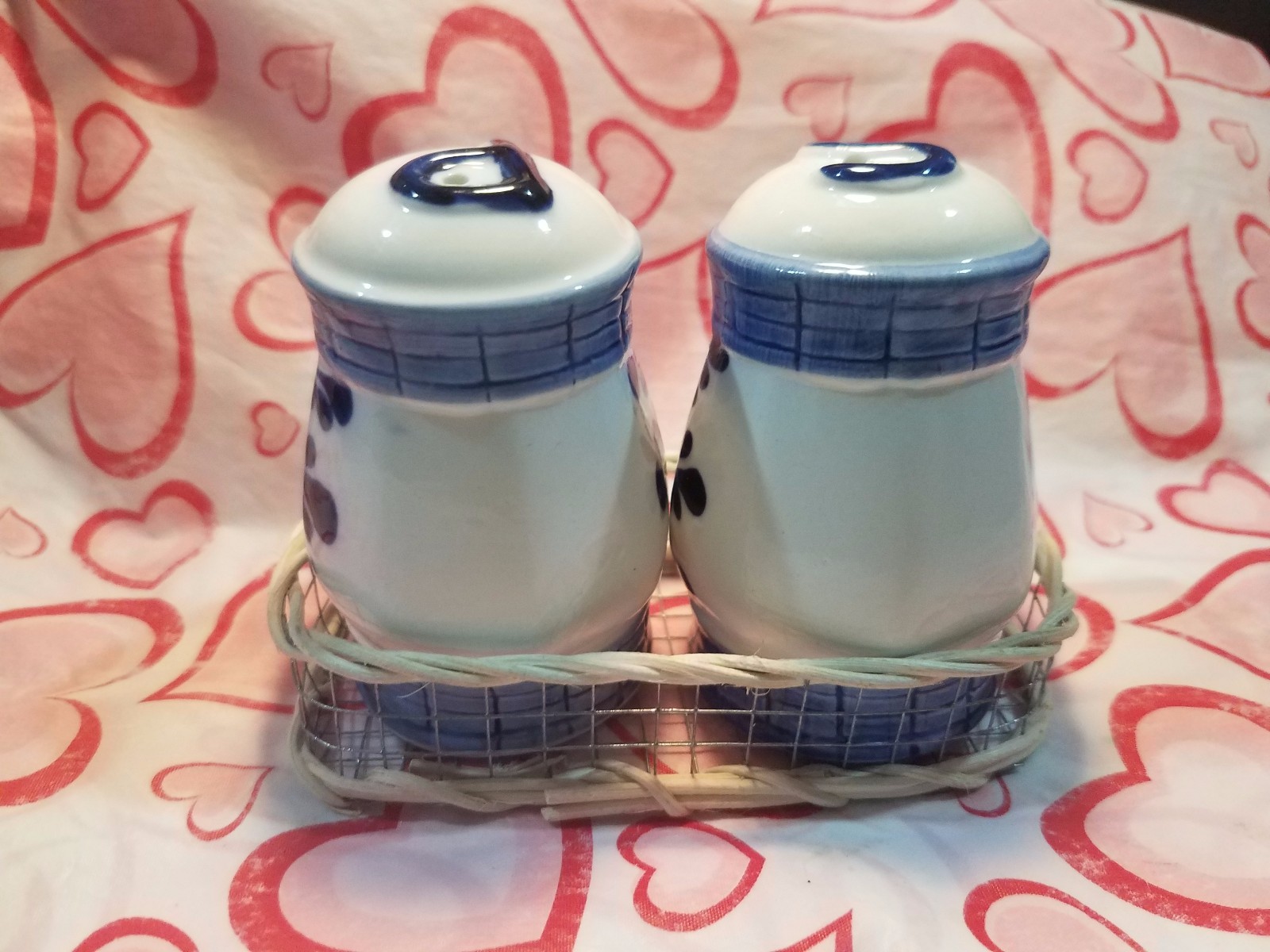 SALT AND PEPPER SHAKERS DUTCHMAN DESIGN--- WITH  WICKER TRAY