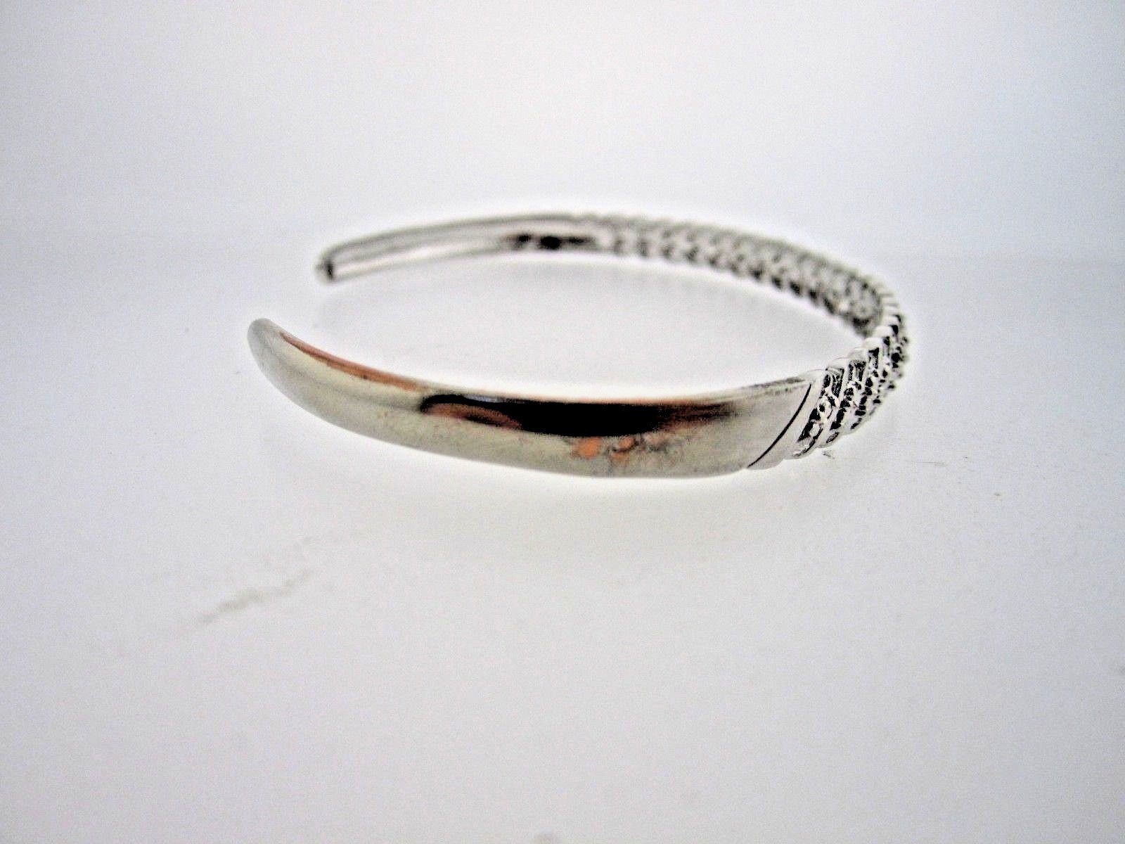 * .925 STERLING SILVER BANGLE  WITH 1 POINT DIAMOND AND LOOK OF DIAS THROUGHOUT