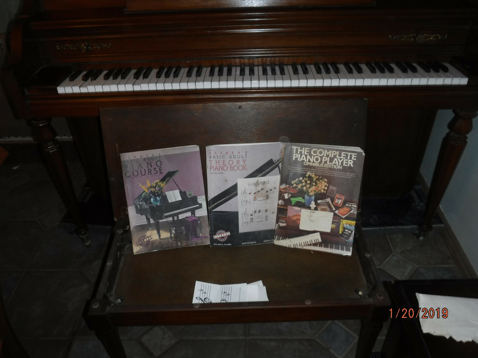 Kimball vertical console piano. 42