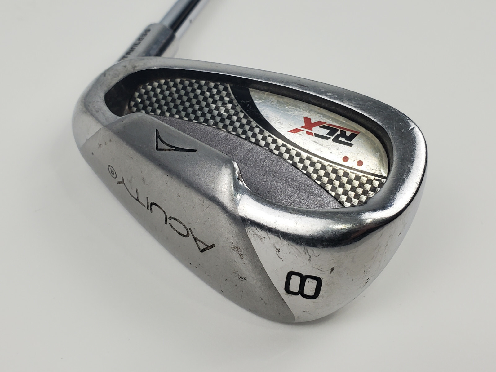 A Detailed Close-Up Shot Of The Head Of A Silver Acuity Rcx 8 Iron Golf Club, Showcasing Its Design And Branding.