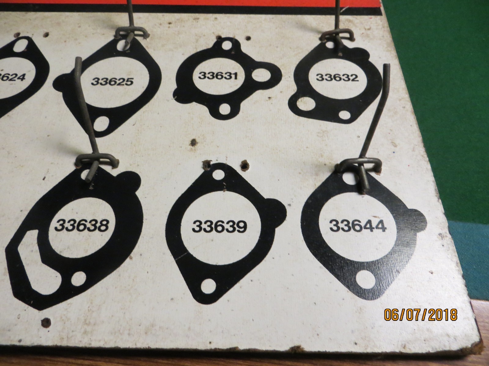 Gates seal eze gaskets auto display rack fiber board wall hanger auto shop sign