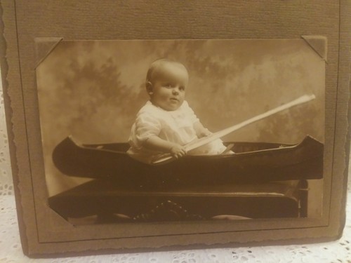 Vintage Black And White Studio Photograph Baby Boy In Canoe With Paddle