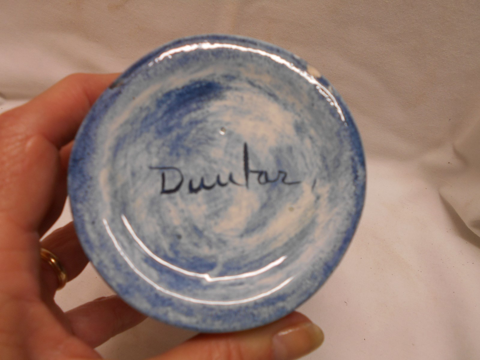 Vintage blue and white water pitcher vintage men drinking beer embossed