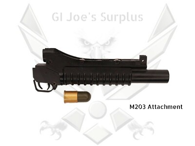 M203