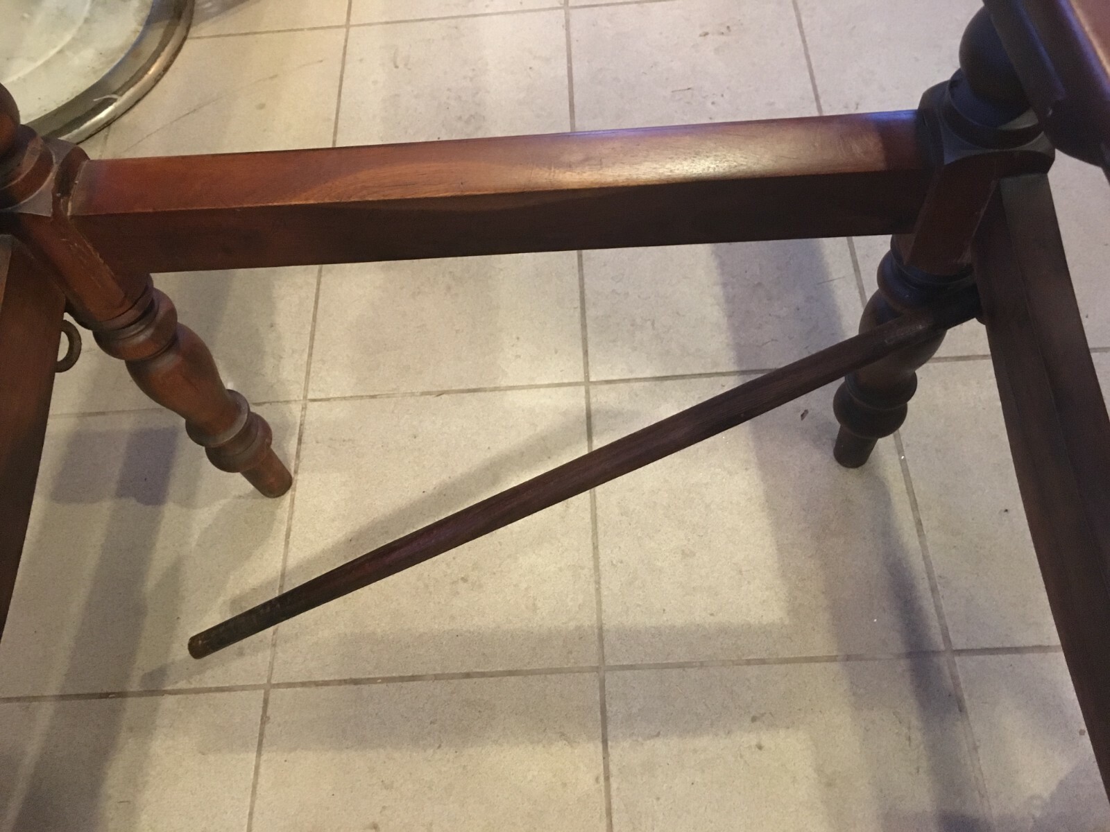 LARGE ANTIQUE PLANTATION CHAIR WITH FOLD OUT ARMS AND ROLLED FABRIC HOLDERS