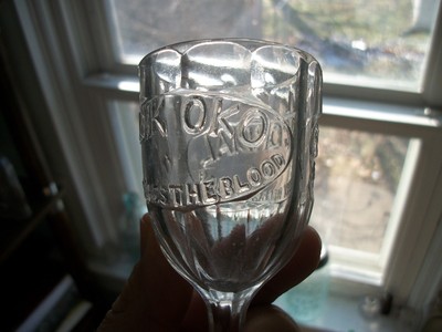 FANCY PANELED STEM DRINKING GLASS OKO CORDIAL REFRESHING IT ENRICHES THE BLOOD