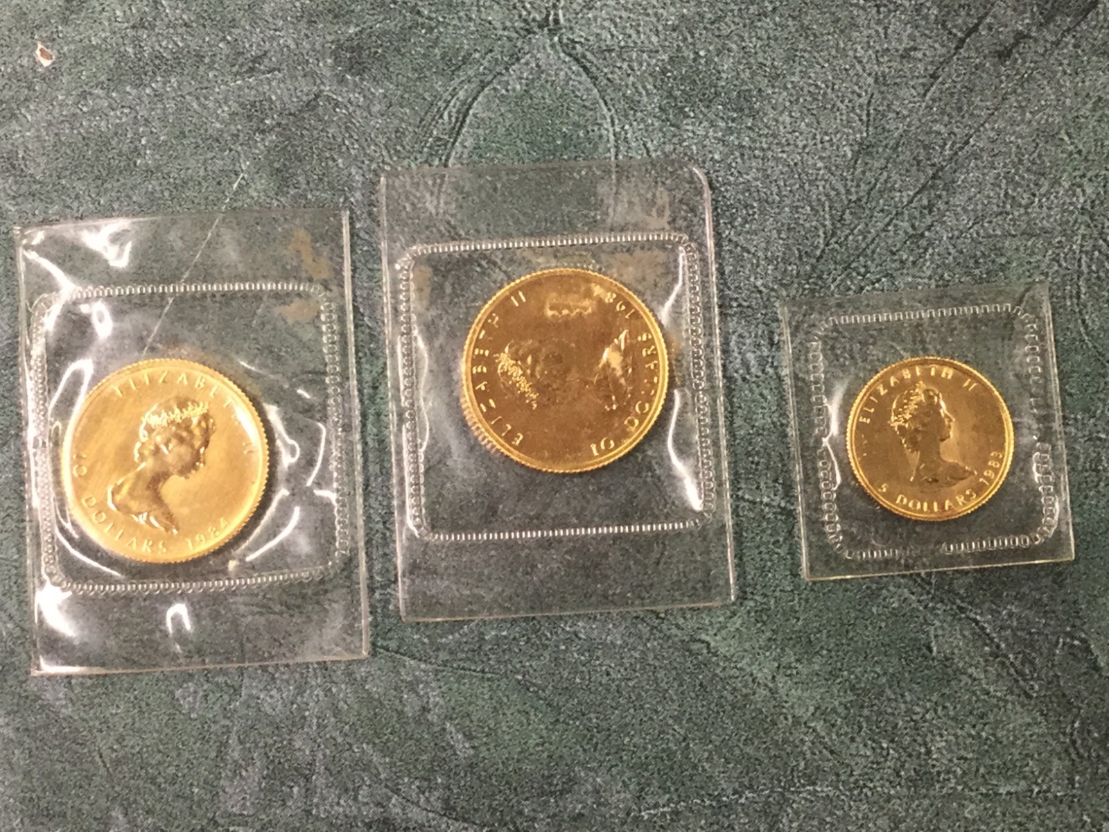 2 x Canada 1/4 oz Gold Maple Leaf 1 x 1/10 oz Gold Maple Leaf