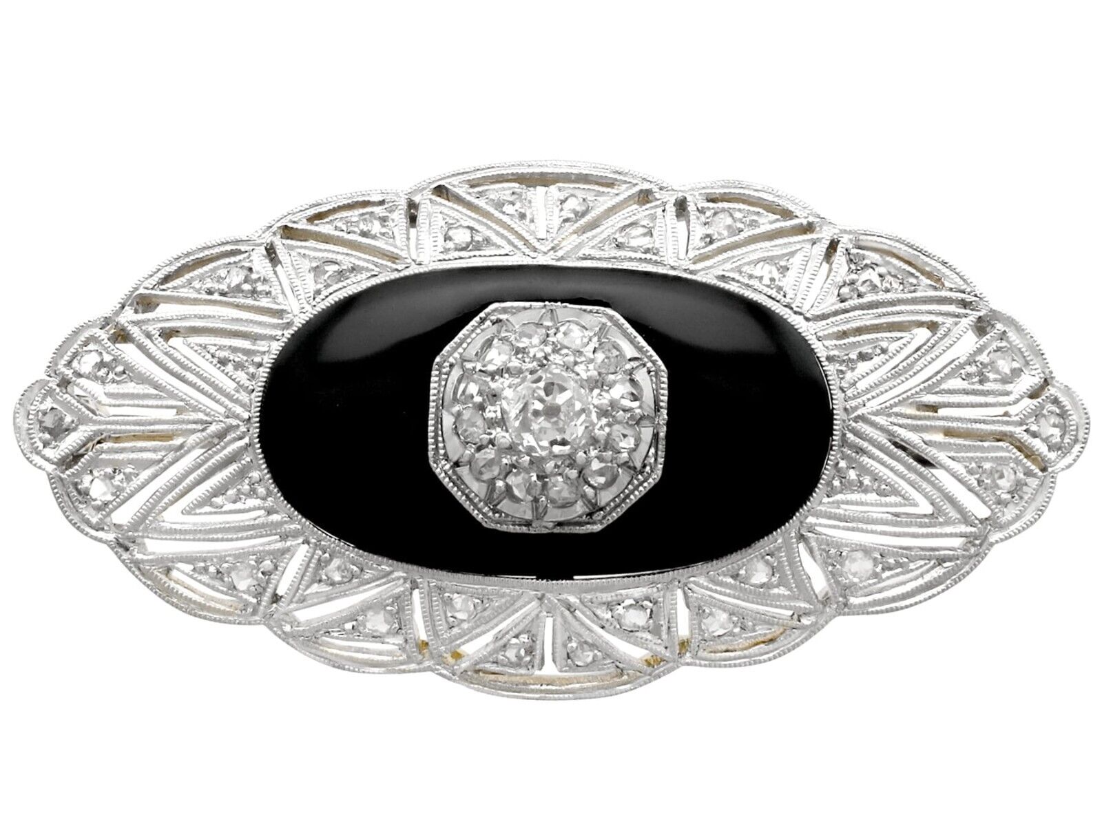 0.57Ct Diamond and Black Onyx, 15k Yellow Gold, Platinum Set 0.57Ct Diamond and Black Onyx, 15k Yellow Gold, Platinum Set