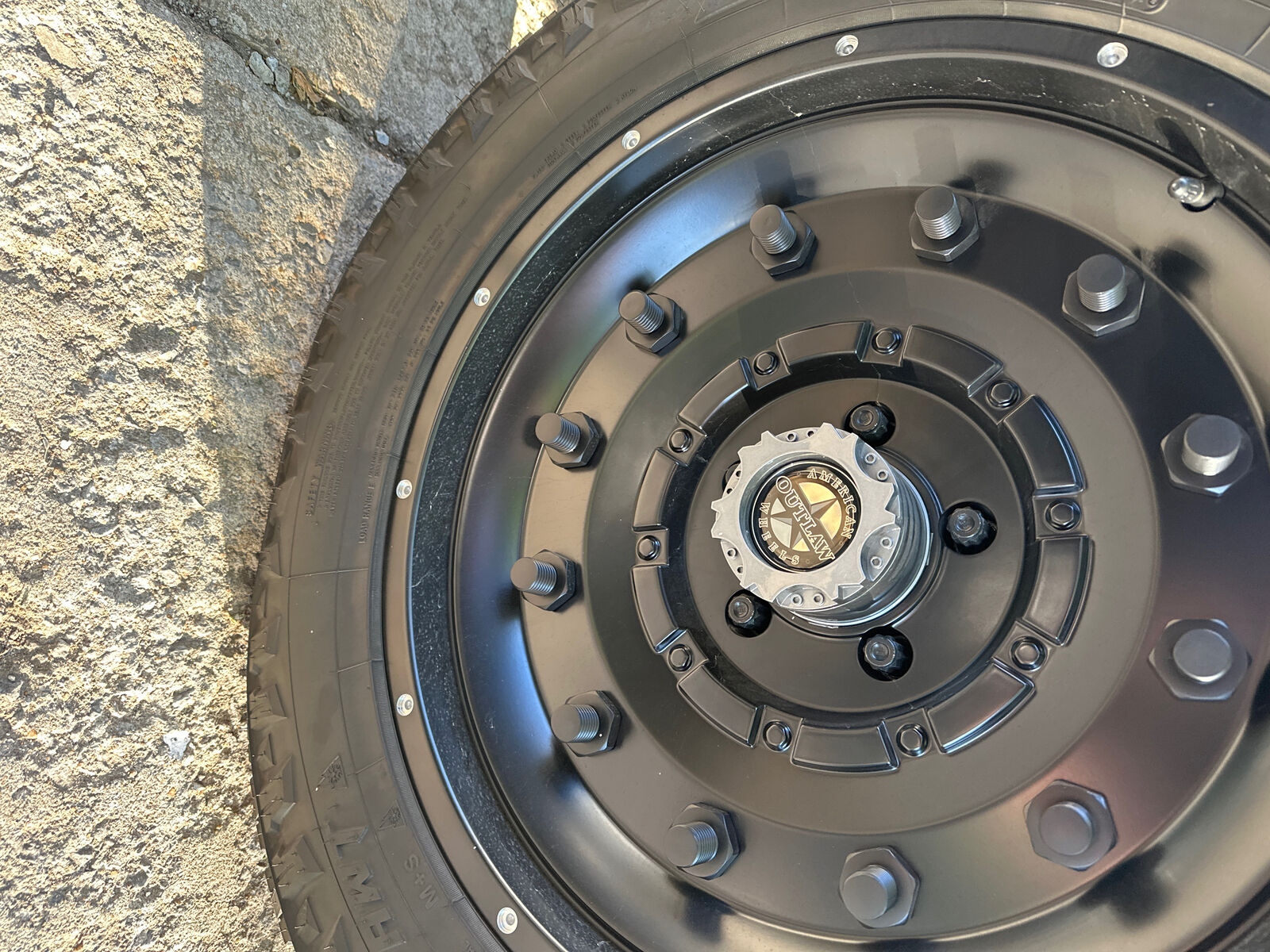 1- American Outlaw Gloss Black Wheel Rim Hub Cover 2 Piece 1- American Outlaw Gloss Black Wheel Rim Hub Cover 2 Piece