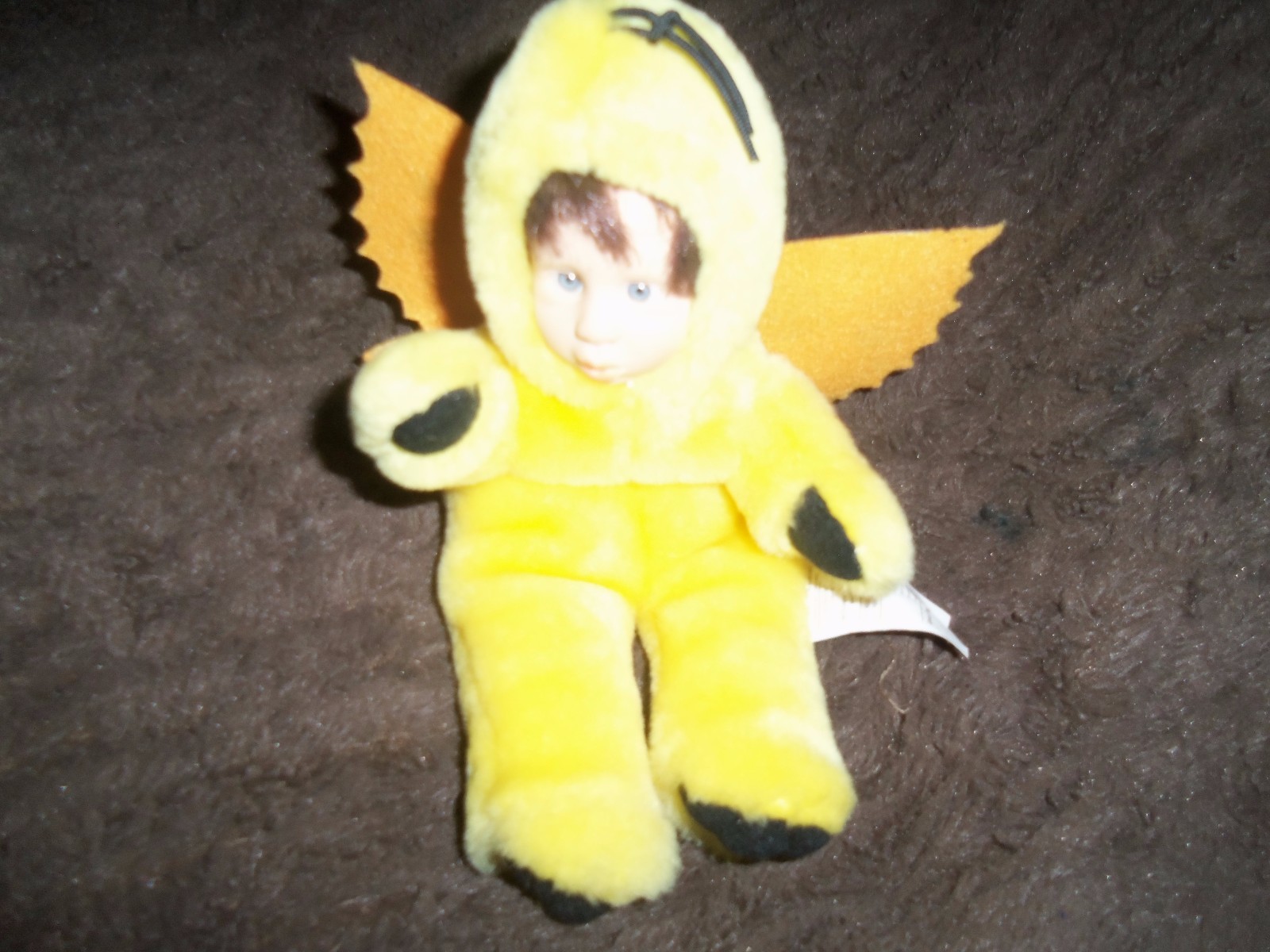 Brown Squirrel Anne Geddes     Yellow doll with wings  -- no name of company