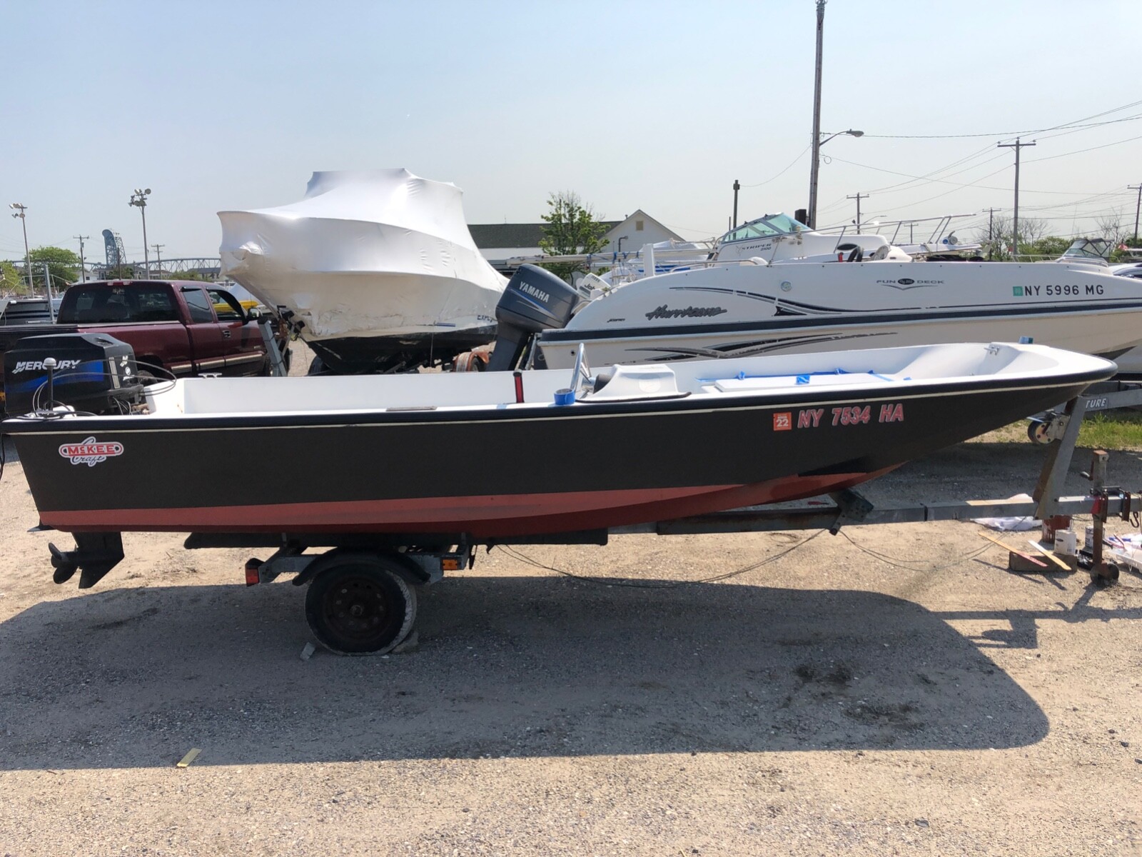 16 ft Mckee Craft Boat with 60 HP Mercury Outboard