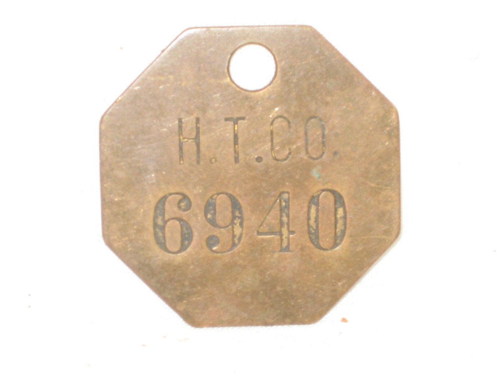 vintage H.T. CO. metal id tag identification octagon shaped vintage H.T. CO. metal id tag identification octagon shaped