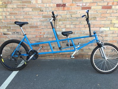 adult and child tandem bike
