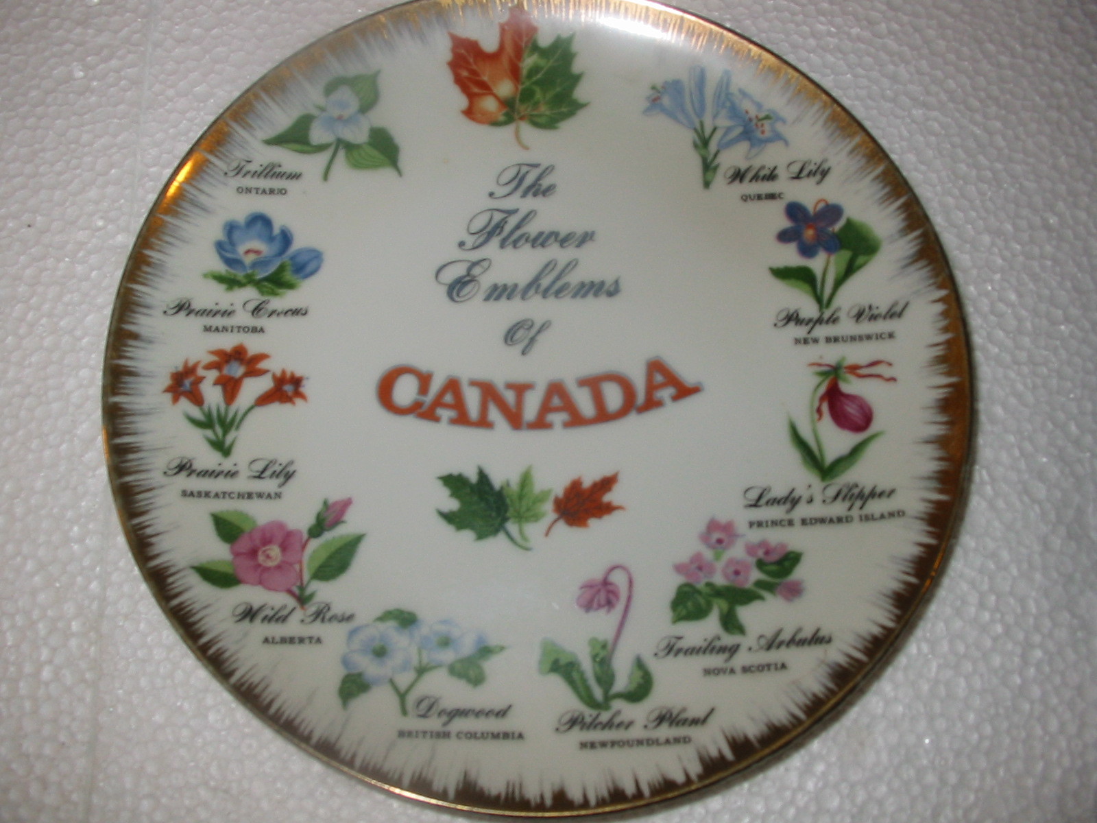 THE FLOWER EMBLEMS OF CANADA COLLECTOR PLATE APPROX 8'' GOLD TRIM HAND PAINTED