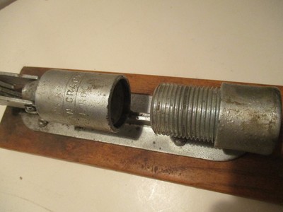 VINTAGE REEDS ROCKET  NUT CRACKER IN ORIGINAL BOX. BOX IS IN POOR CONDITION.