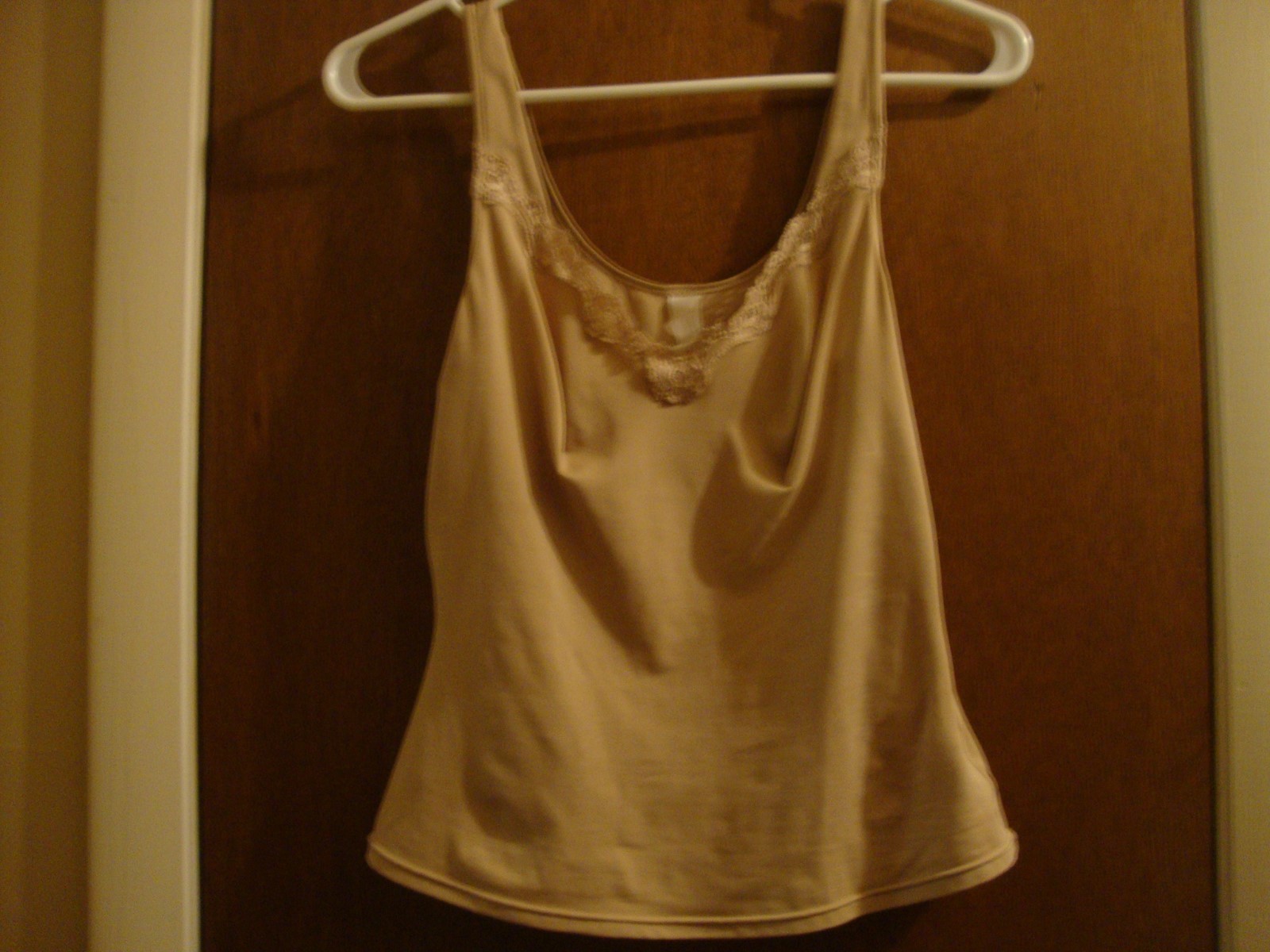 lot of 3 Size L ladie's clothing items: Multi-color top, beige sweater, camisole
