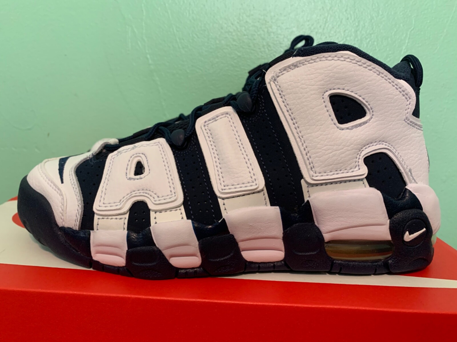 nike uptempo 38