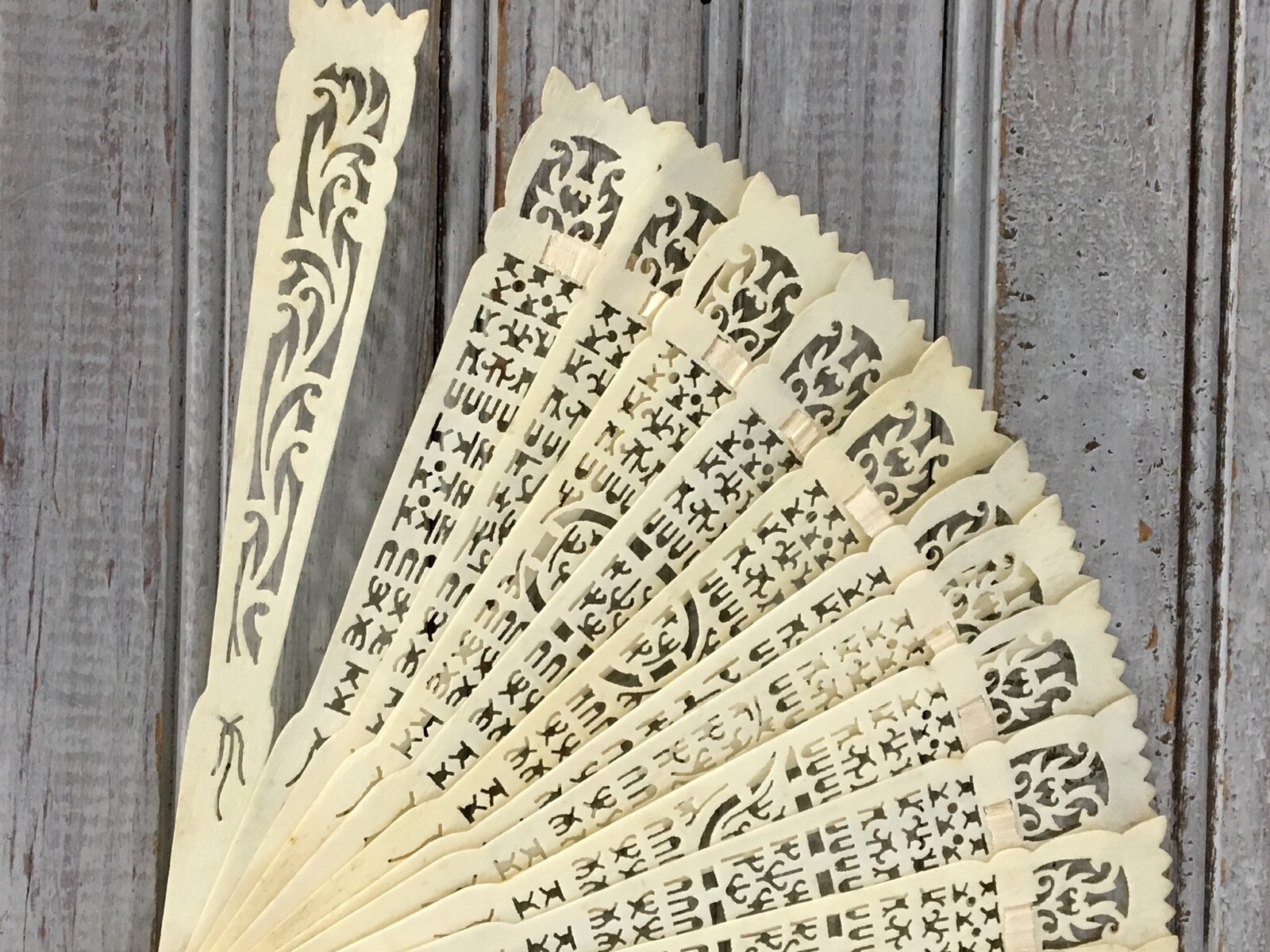 Antique Carved Chinese Bone Fan Bovine