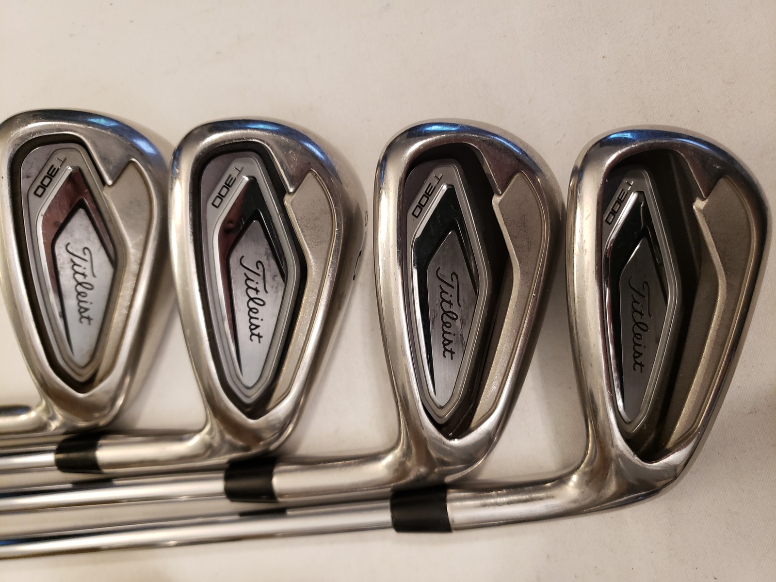 Used Titleist T300 Iron Set (4-PW, GW) 8 Irons - Stock AMT Red R300 - Reg - RH