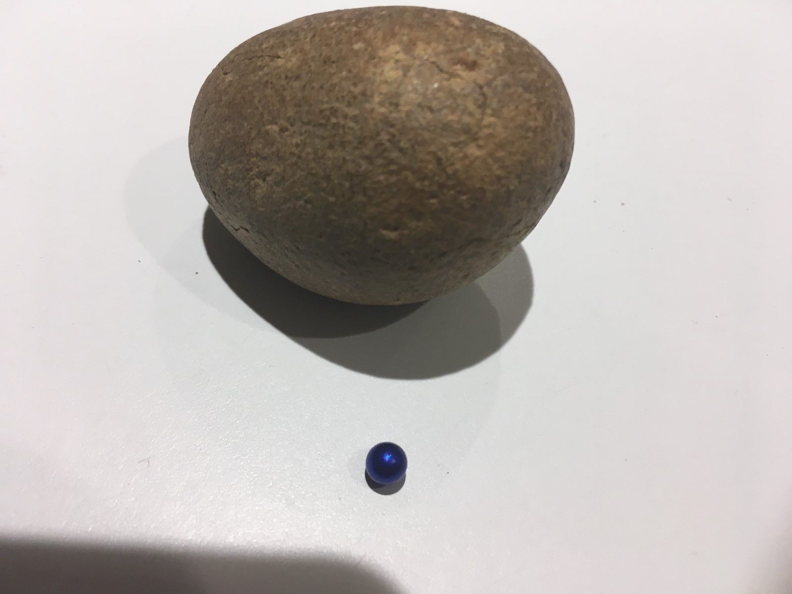 Strange Unique Rock a Ball Magnet Sticks to it - A Fossil Egg or Meteor ?