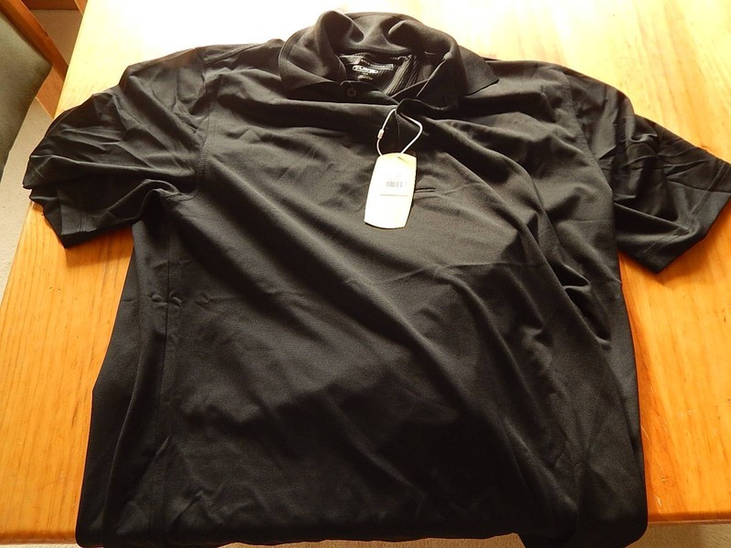 Greg Norman mens golf shirt, size large 