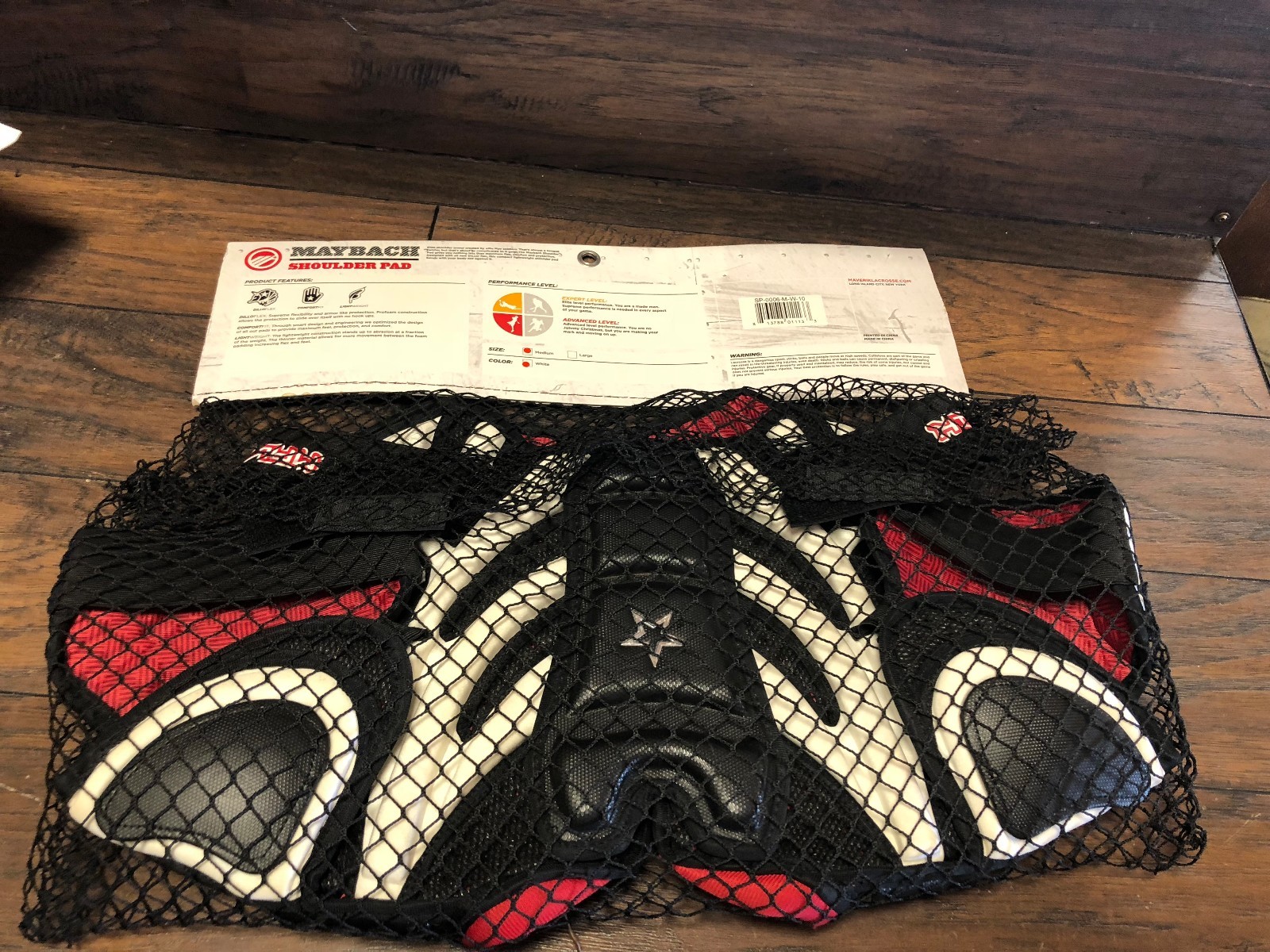 23071 New in Package  Lacrosse Shoulder Pad / Size Medium / Mayback Maverik