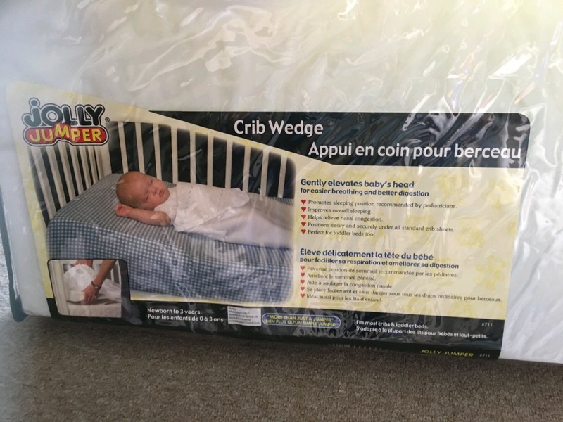 jolly jumper crib wedge