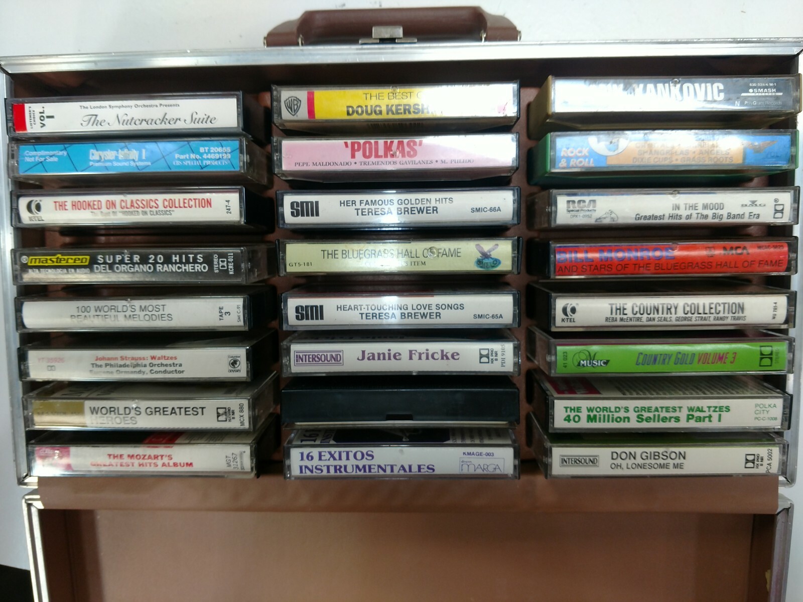 24 Cassette Carrying Case Briefcase with 24 Misc. Cassettes Country Polka Mozart