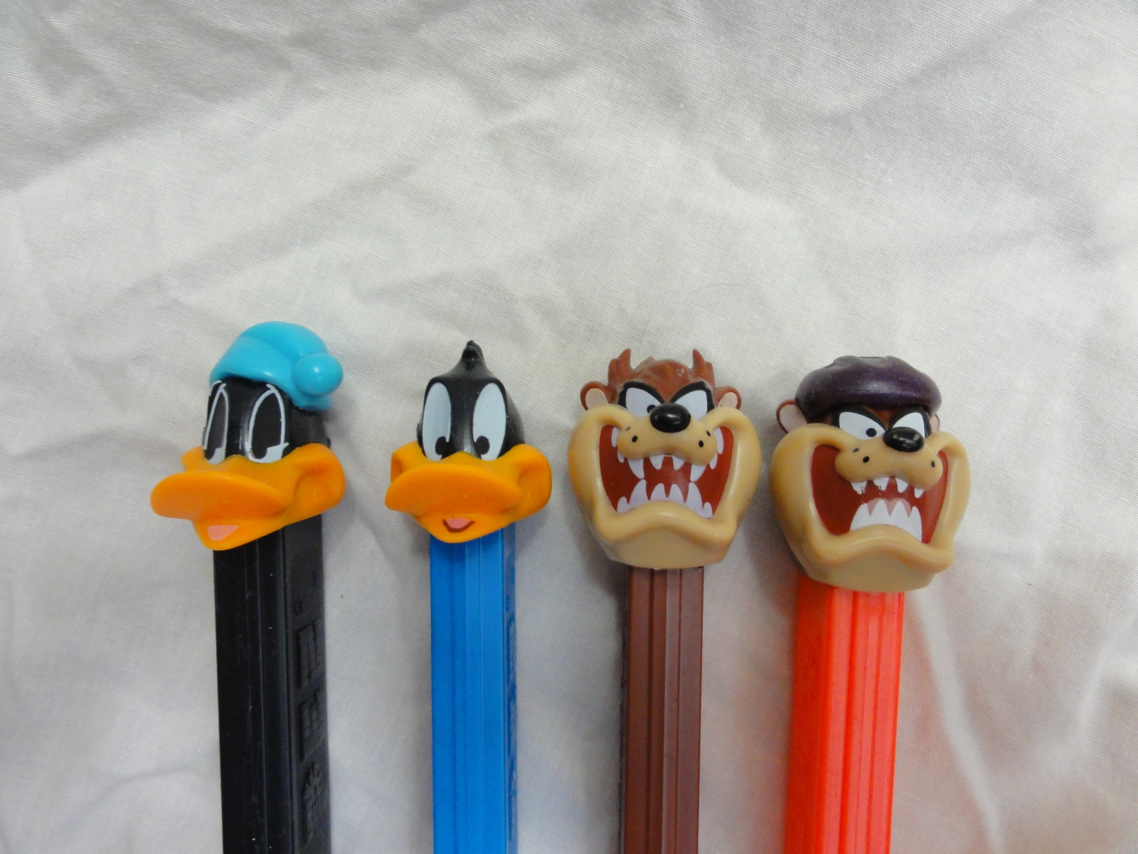 Pez Lot 4 LOONEY TUNES Daffy Duck Issue B/Sleepy ~ Tasmanian Devil A/Cycling Taz