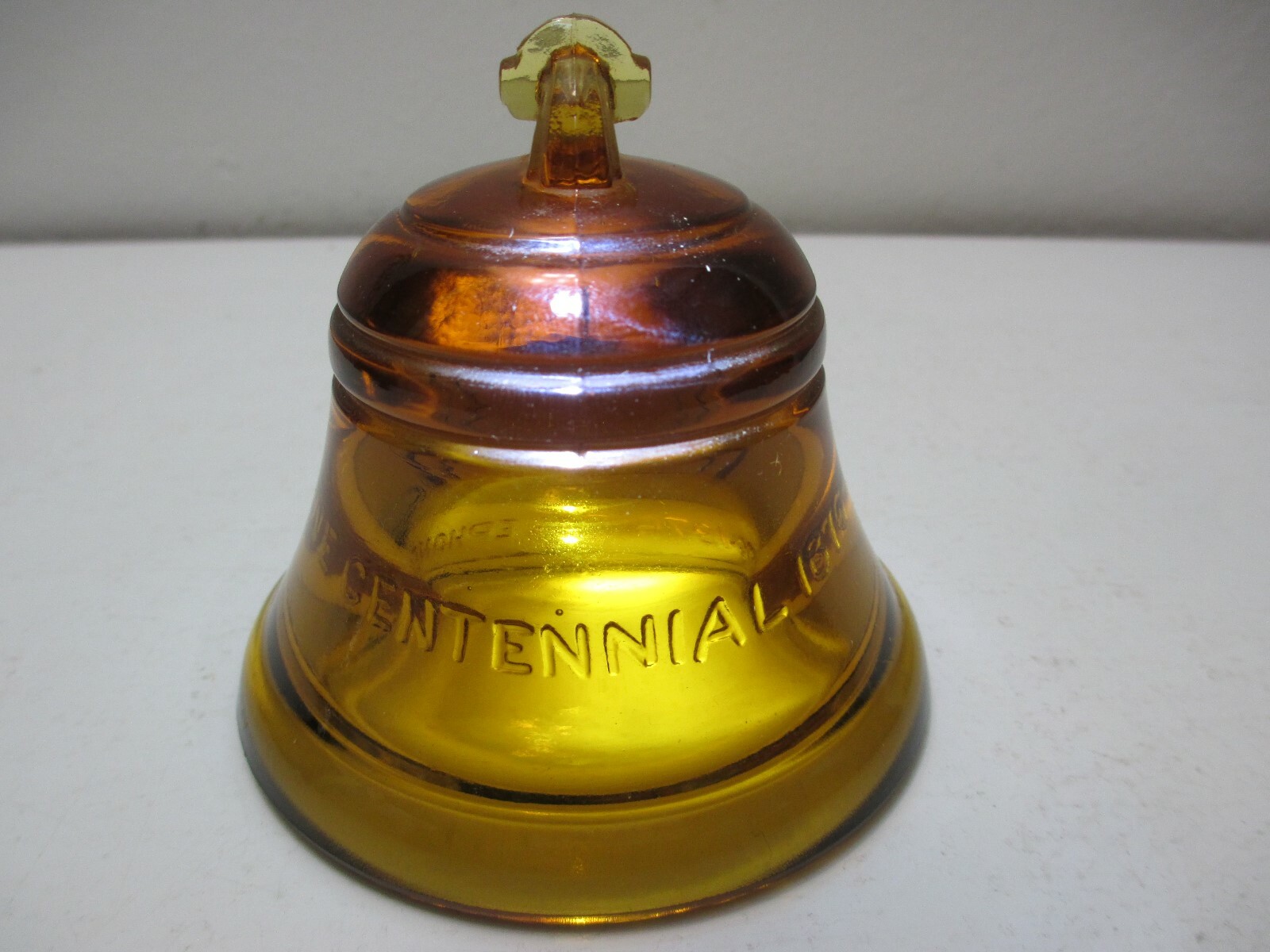 Vintage Telephone Pioneers of America Glass Bell Centenial 1976 Amber