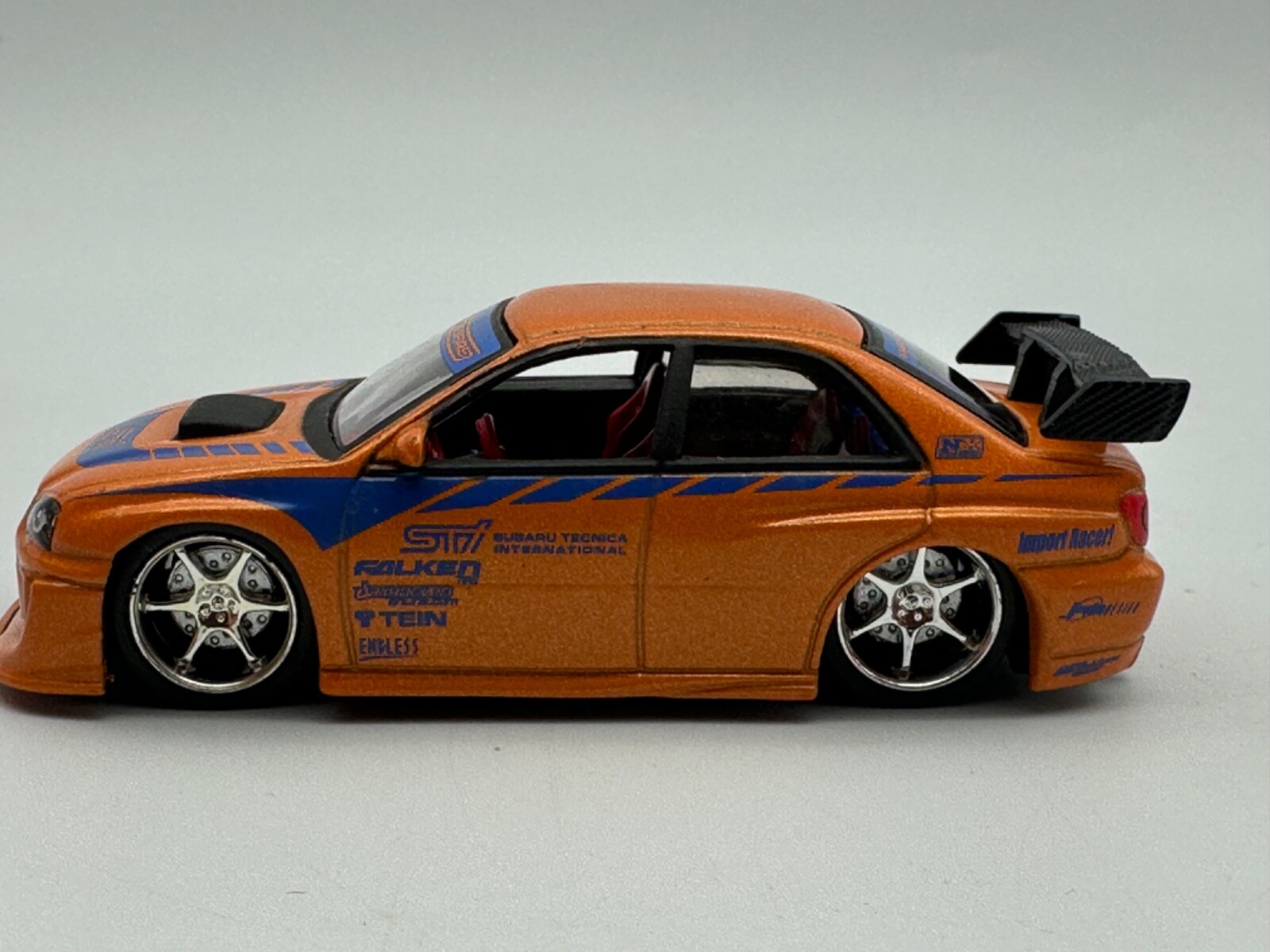 Jada Toys Diecast Import Racer Subaru Impreza WRX, Orange, 1 Jada Toys Diecast Import Racer Subaru Impreza WRX, Orange, 1