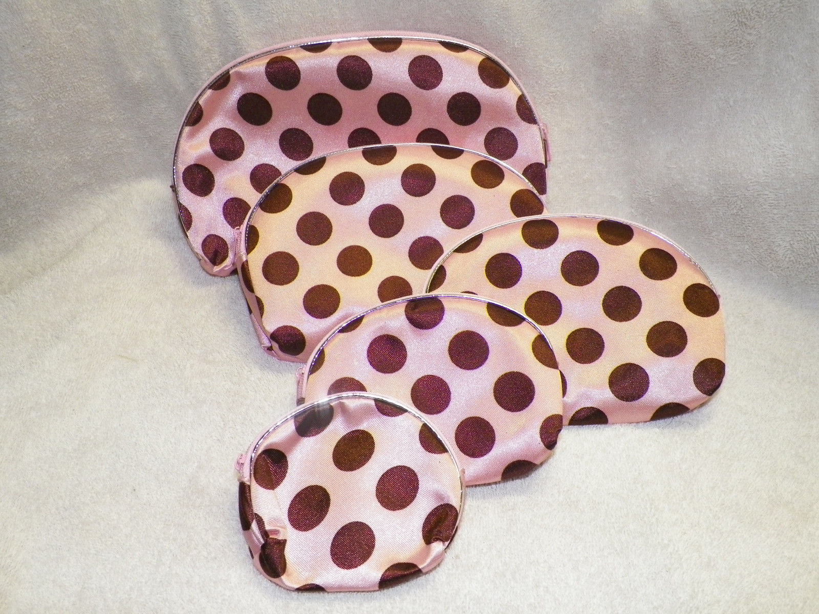 Bolsos y estuches de maquillaje de satén PINK