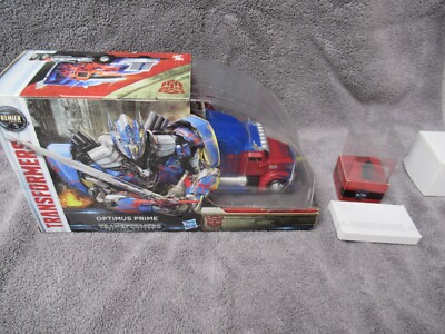 TRANSFORMERS SDCC OPTIMUS PRIME BURNING RUBBER THE LAST KNIGHT WITH TIRE MISB