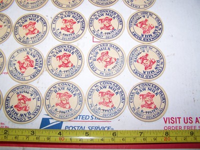 VINTAGE1/2 PINT  MILK BOTTLE CAPS CHARLES M CONNARD DAIRY DECATUR, ILLINOIS