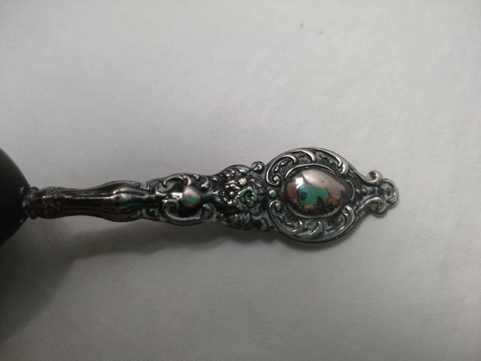 Antique Art Nouveau Sterling Silver Repousse Handle and Ebony Sock Darning Egg