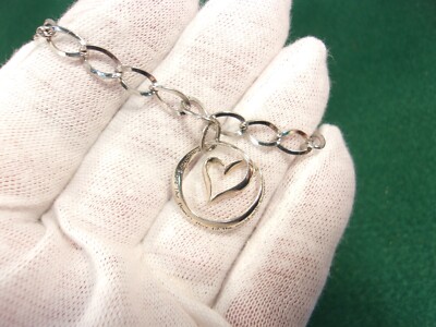 NEAR MINT COND RHODIUM PLATED STERLING SILVER ''DAUGHTERS'' HEART CHARM BRACELET