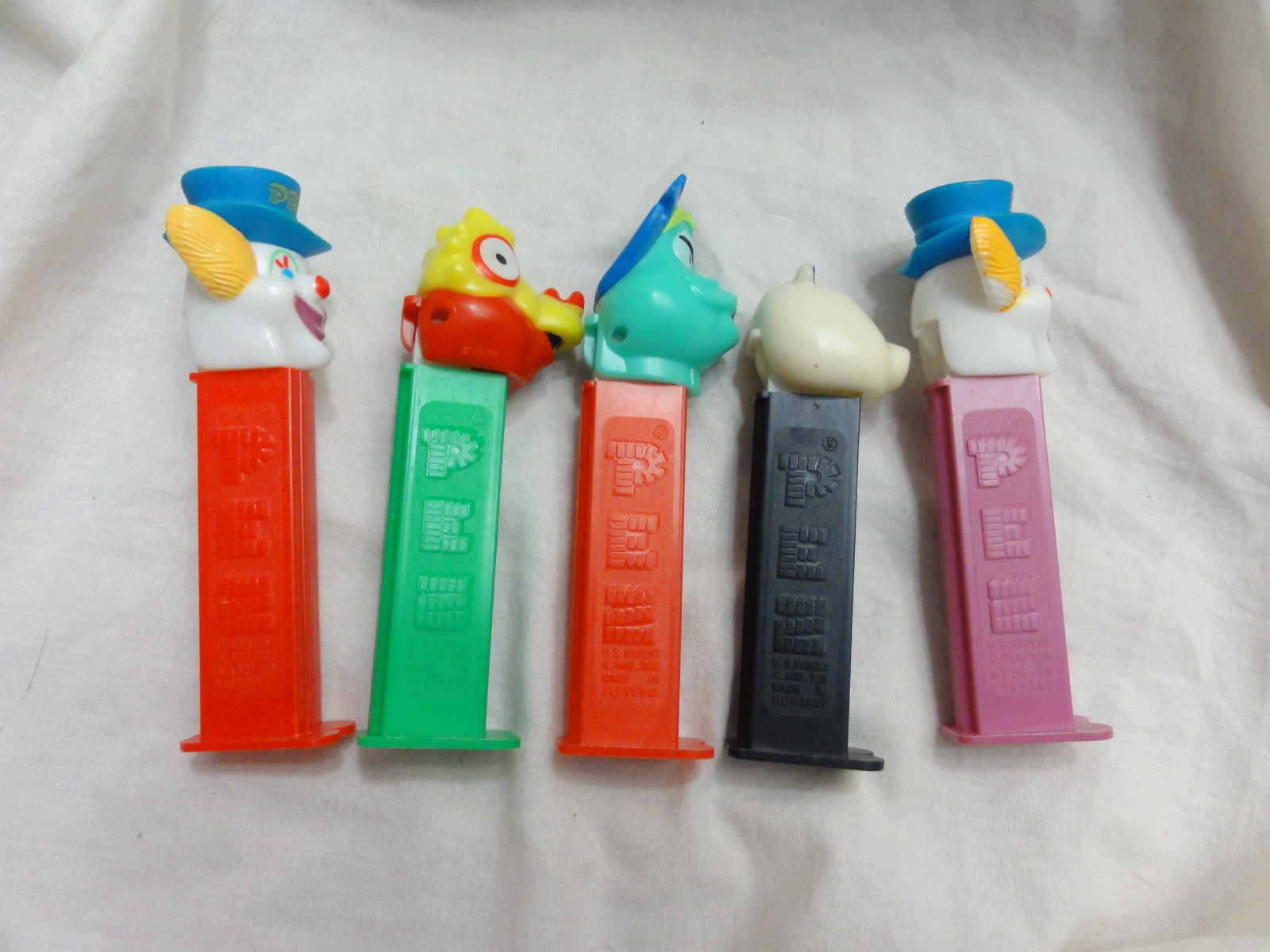 Pez Lot 5 Panda, SHE-SAUR, I-Saur, Peter PEZ Clown Issue B Purple/Red Stem