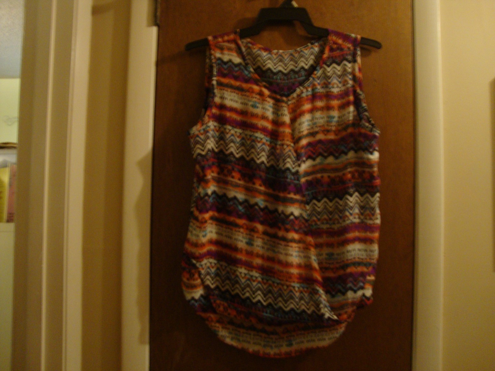 lot of 3 Size L ladie's clothing items: Multi-color top, beige sweater, camisole